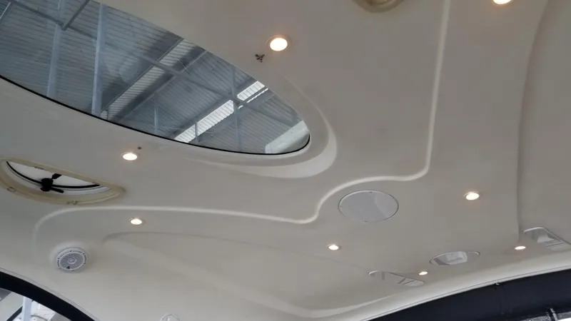 Slide: The Image of Interior ceiling of 2006 Cruisers Yachts 52 Express with skylights and recessed lighting. - 25