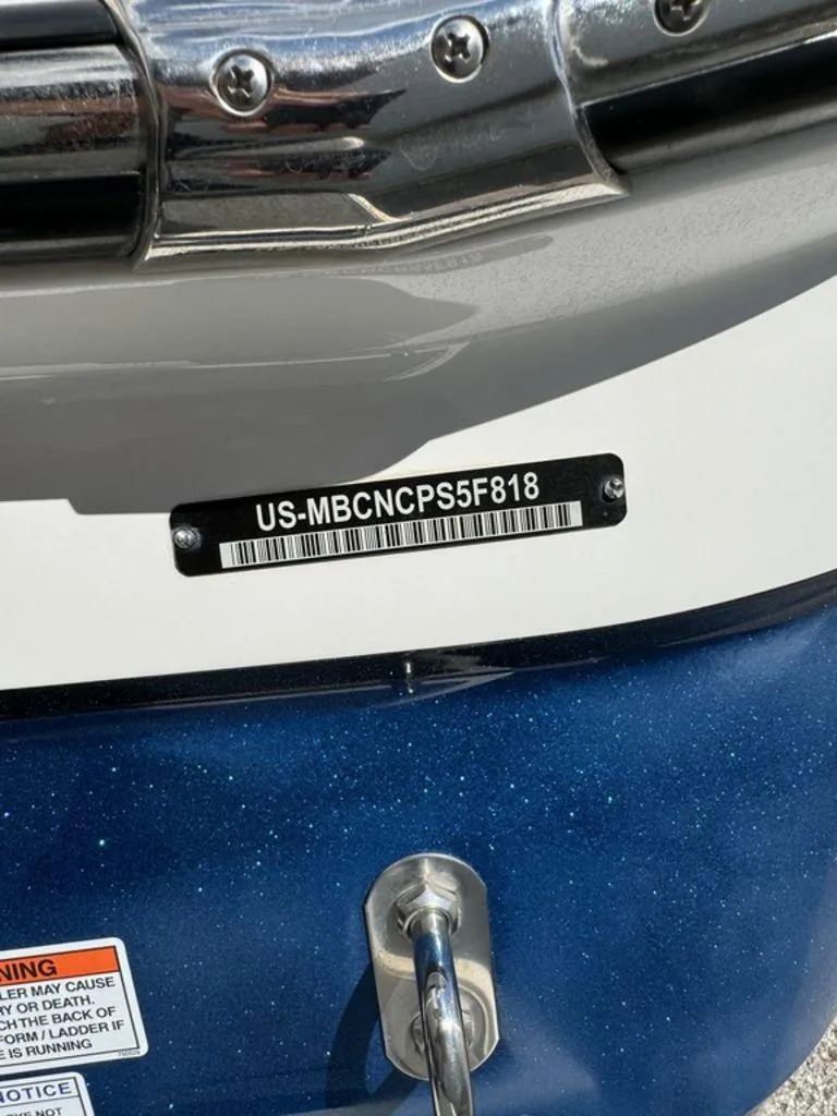 Slide: The Image of 2018 MasterCraft X23 boat with visible hull identification number. - 7