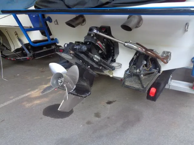 Slide: The Image of 2001 Warlock 29 World Class boat stern with propeller and exhaust system. - 13