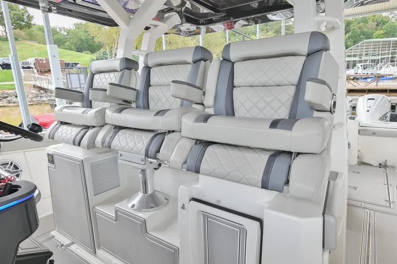 Slide: The Image of 2021 Pursuit S 428 Sport boat with luxurious seating and modern design. - 33