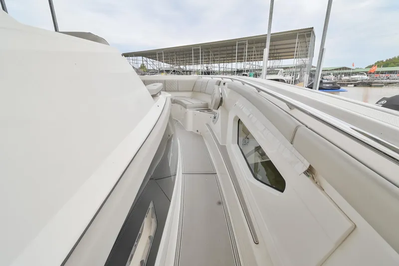 Slide: The Image of 2021 Pursuit S 428 Sport boat deck, featuring sleek design and modern amenities. - 38