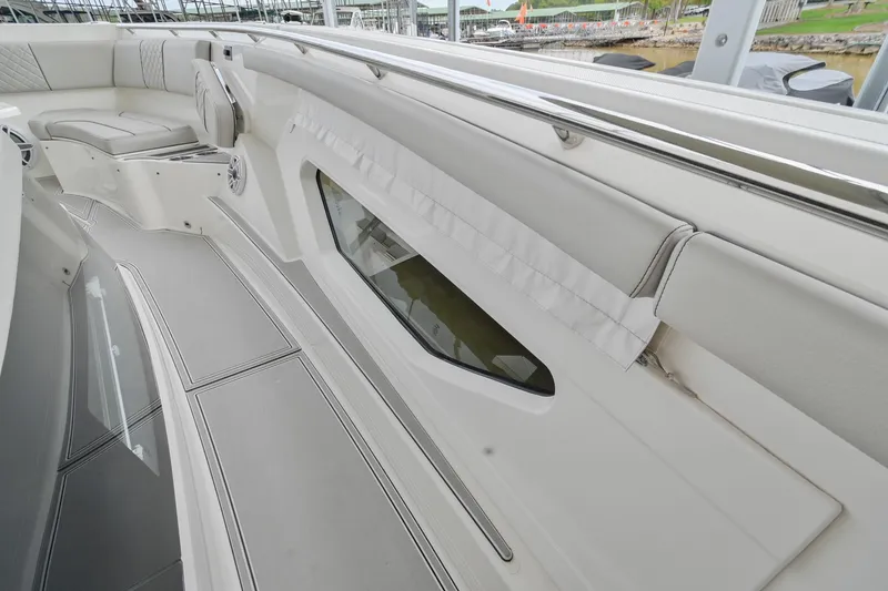 Slide: The Image of 2021 Pursuit S 428 Sport boat interior with sleek seating and modern design. - 39
