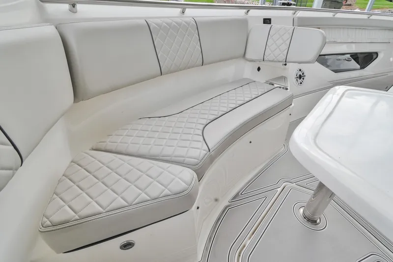 Slide: The Image of Luxurious seating on 2021 Pursuit S 428 Sport boat with quilted upholstery. - 45
