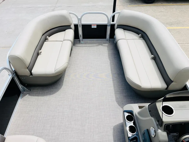 Slide: The Image of 2025 Sun Tracker Party Barge 16 DLX interior with spacious seating and modern design. - 12