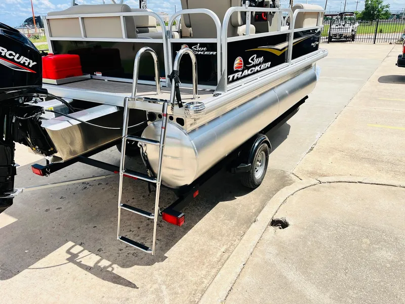 Slide: The Image of 2025 Sun Tracker Party Barge 16 DLX pontoon boat with ladder and Mercury engine. - 9