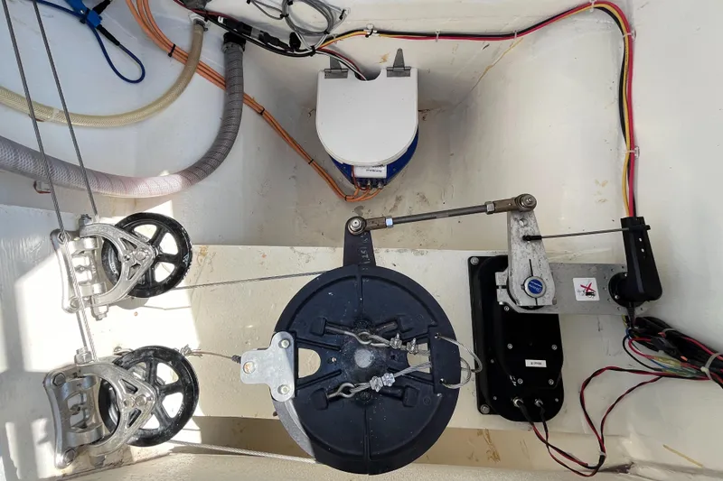 Slide: The Image of Interior view of 2018 Maine Cat 38 Electric boat's mechanical components and wiring. - 19