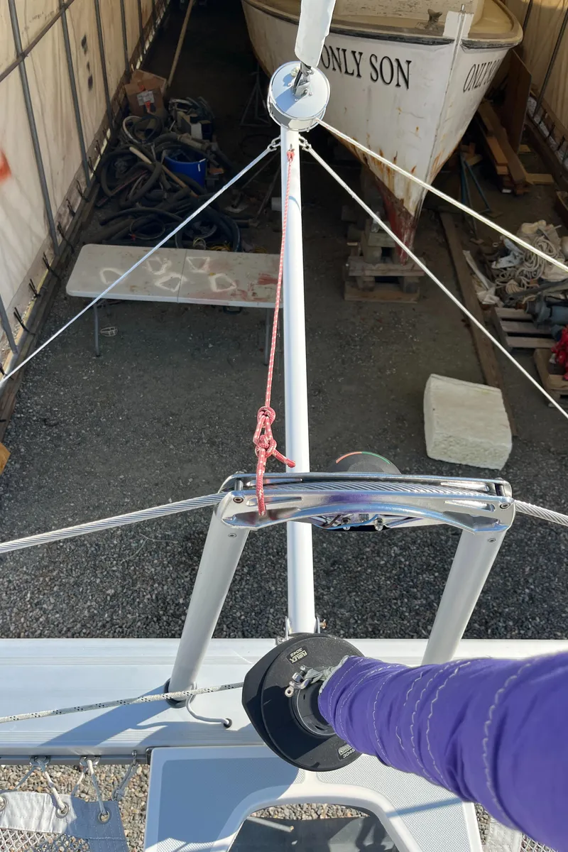 Slide: The Image of Maine Cat 38 Electric sailboat mast and rigging in a boatyard, 2018 model. - 26