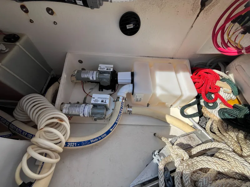 Slide: The Image of Boat equipment compartment with ropes and pumps, Maine Cat 38 Electric, 2018 model. - 29