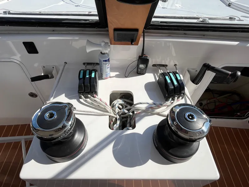 Slide: The Image of Control panel of a 2018 Maine Cat 38 Electric boat with winches and ropes. - 39
