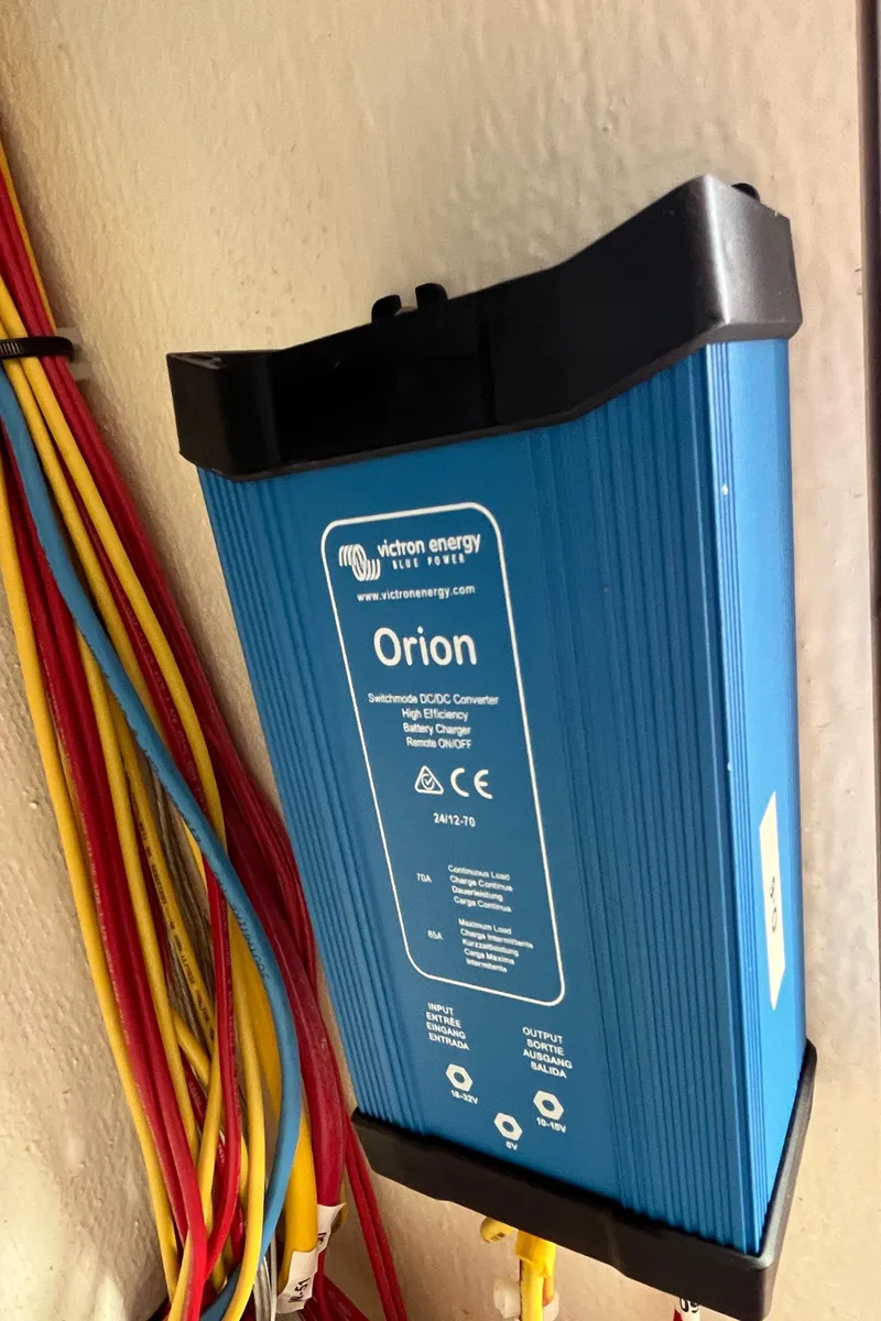 Slide: The Image of Victron Energy Orion DC-DC converter with colorful wiring, installed on a Maine Cat 38 Electric. - 42