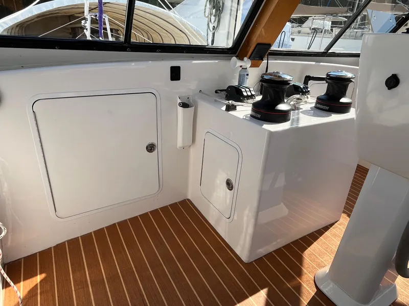 Slide: The Image of Interior of 2018 Maine Cat 38 Electric with sleek controls and wooden flooring. - 43