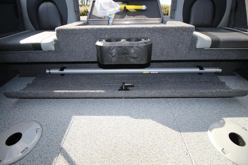 Slide: The Image of 2024 Lund 1775 Crossover XS interior with seating and storage compartments. - 13