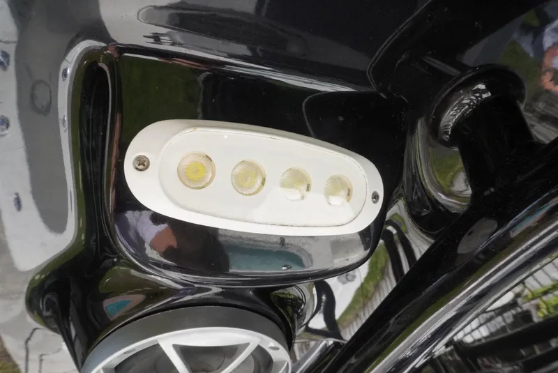 Slide: The Image of Close-up of 2021 Sea Pro 219 boat's LED light and speaker. - 29