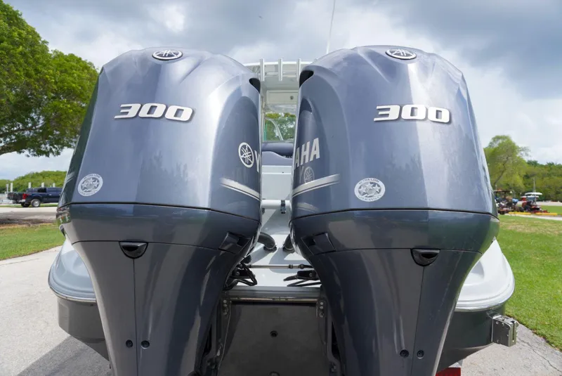 Slide: The Image of Twin Yamaha 300 engines on a 2004 Baja 340 Sportfish boat. - 16