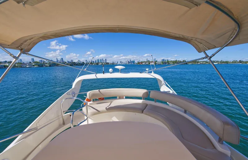 Slide: The Image of Aicon 56 yacht interior with city skyline view, 2003 model. - 34