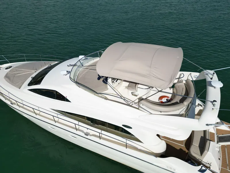 Slide: The Image of Aicon 56 yacht, 2003 model, cruising on calm waters. - 5