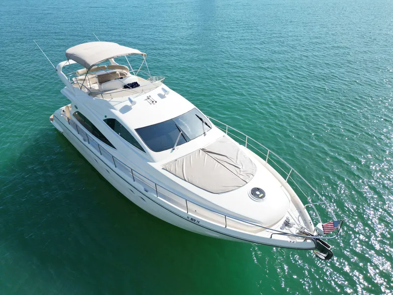 Slide: The Image of Aicon 56 yacht from 2003 on clear turquoise water, aerial view. - 9