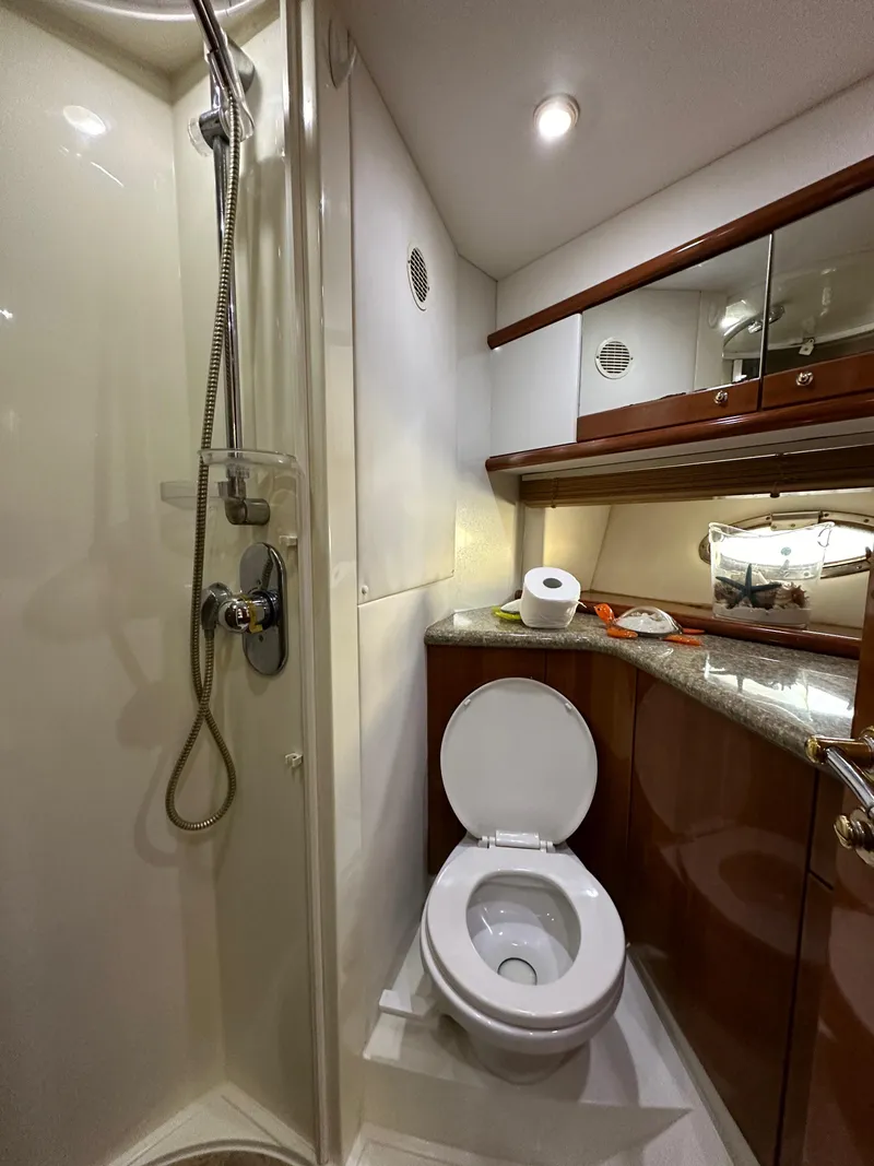 Slide: The Image of 2001 Sunseeker 44 Camargue yacht bathroom with shower and toilet. - 10