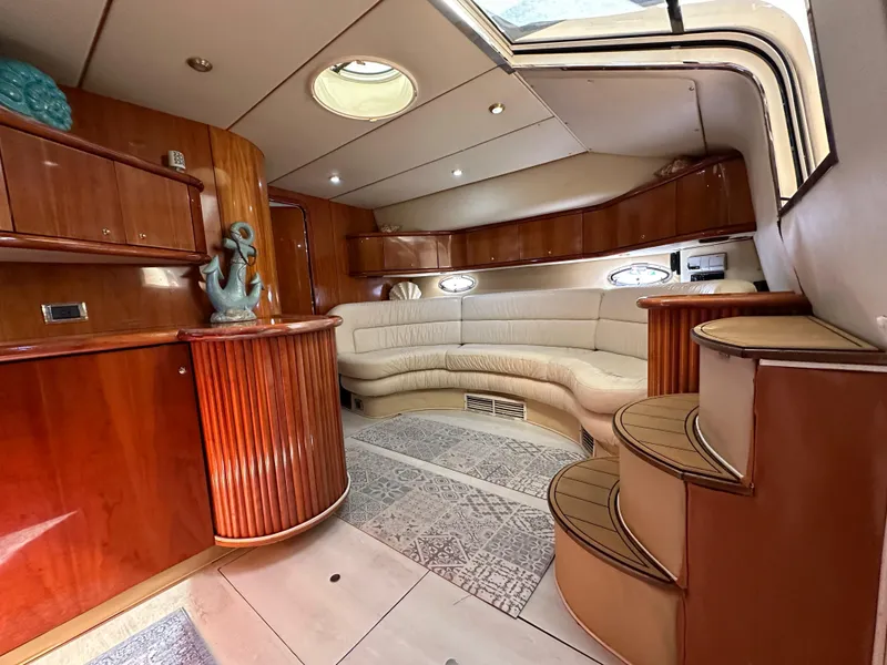 Slide: The Image of Luxurious 2001 Sunseeker 44 Camargue yacht interior with elegant wood and leather furnishings. - 18