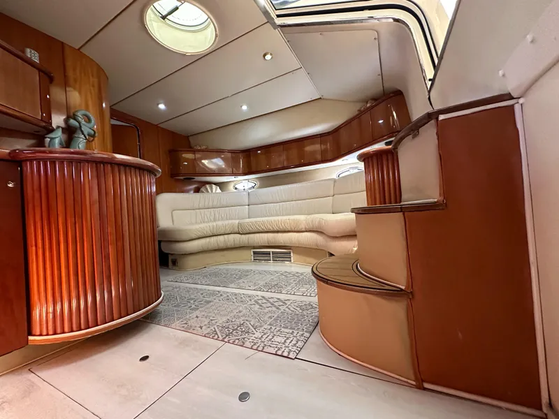 Slide: The Image of Luxurious interior of 2001 Sunseeker 44 Camargue yacht with elegant wood finishes. - 20
