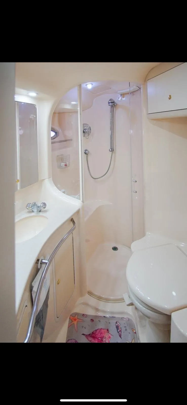 Slide: The Image of Bathroom interior of 2001 Sea Ray 480 Sedan Bridge yacht. - 29