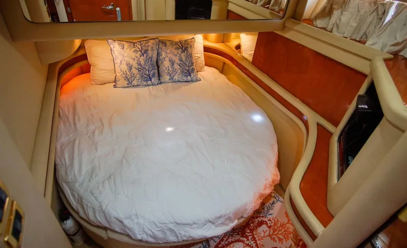 Slide: The Image of Luxurious bedroom interior of 2001 Sea Ray 480 Sedan Bridge yacht. - 45
