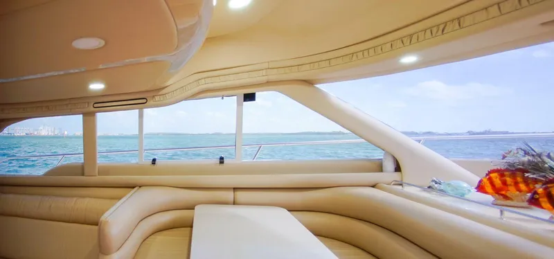 Slide: The Image of Luxurious interior of 2001 Sea Ray 480 Sedan Bridge yacht with ocean view. - 46