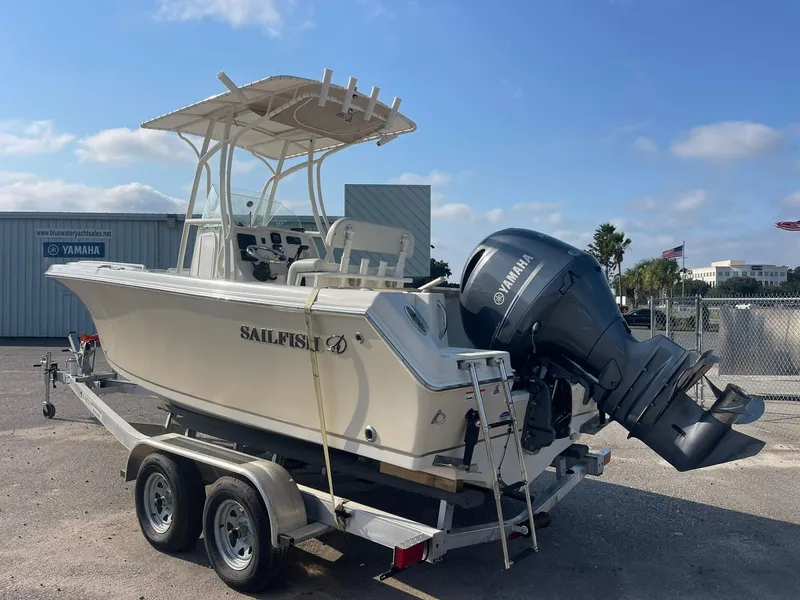 Slide: The Image of 2016 Sailfish 220 CC boat on trailer with Yamaha outboard motor. - 7