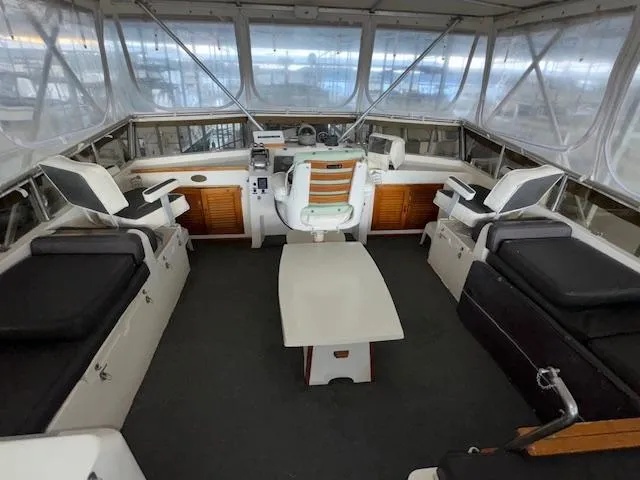 Slide: The Image of Interior of 1987 Seamaster 48 Motor Yacht with seating and helm station. - 12