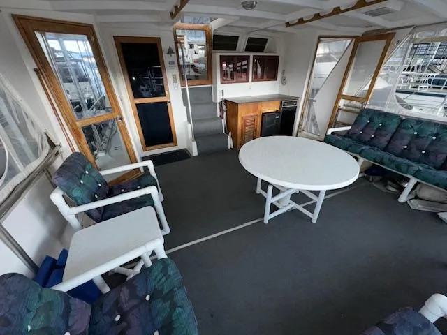 Slide: The Image of Interior of 1987 Seamaster 48 Motor Yacht with seating and table. - 20