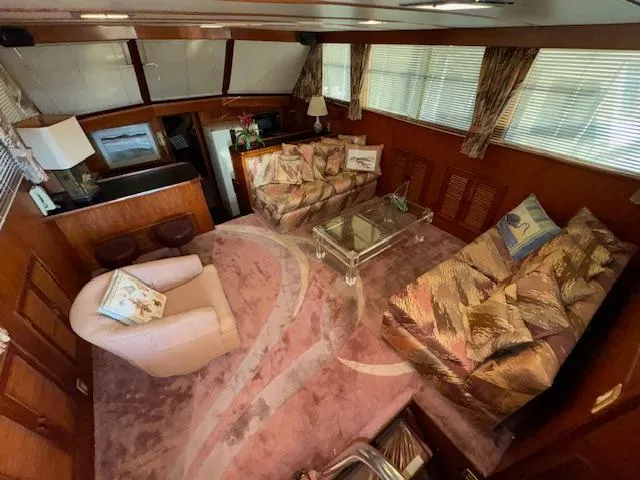 Slide: The Image of Interior of 1987 Seamaster 48 Motor Yacht with plush seating and elegant decor. - 26