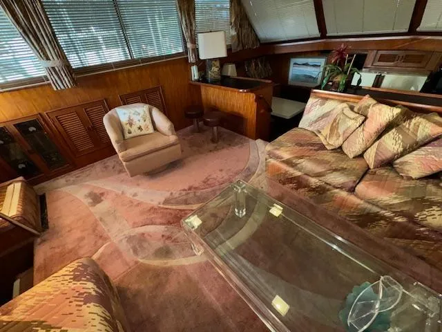 Slide: The Image of Luxurious 1987 Seamaster 48 Motor Yacht interior with plush seating and elegant decor. - 29