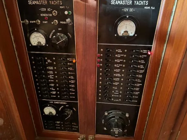 Slide: The Image of Control panel of a 1987 Seamaster 48 Motor Yacht with gauges and switches. - 31