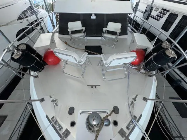 Slide: The Image of 1987 Seamaster 48 Motor Yacht deck with chairs and safety equipment. - 4