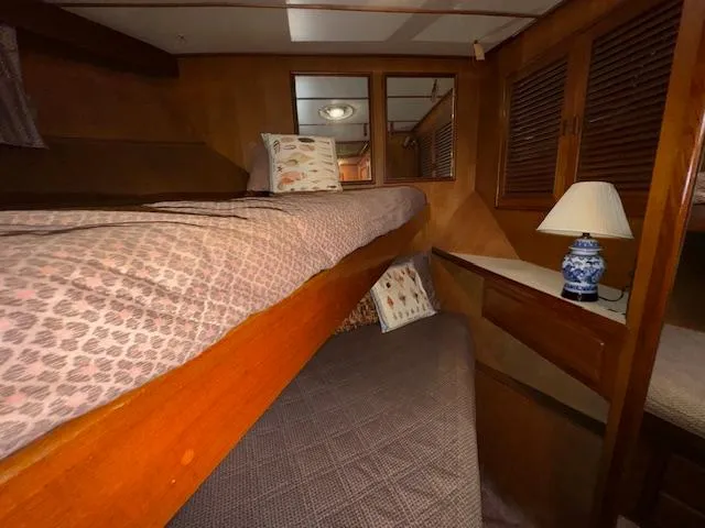 Slide: The Image of Interior cabin of 1987 Seamaster 48 Motor Yacht with cozy bunk beds and lamp. - 40