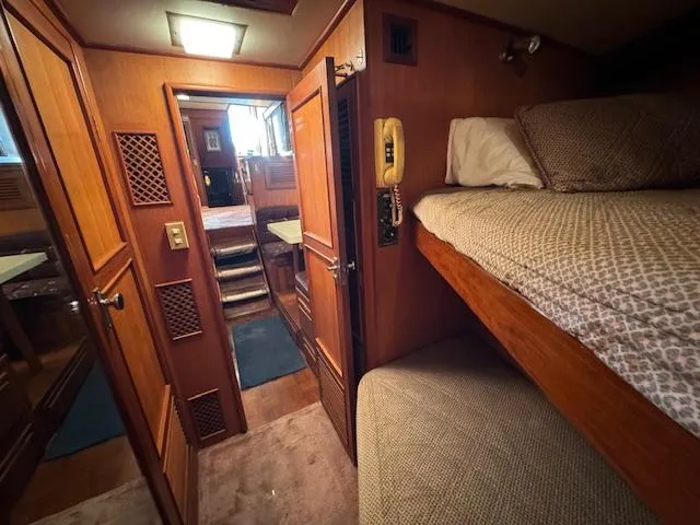 Slide: The Image of Interior of 1987 Seamaster 48 Motor Yacht with wooden paneling and bunk beds. - 44