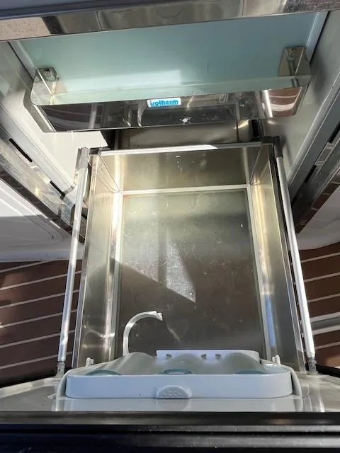 Slide: The Image of 2009 Four Winns V435 yacht interior with built-in ice maker. - 20