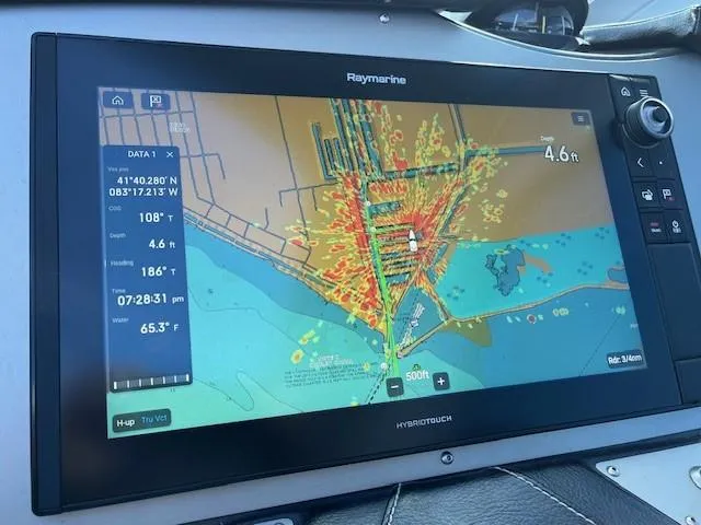 Slide: The Image of Raymarine navigation display on 2009 Four Winns V435 boat, showing detailed marine chart. - 23