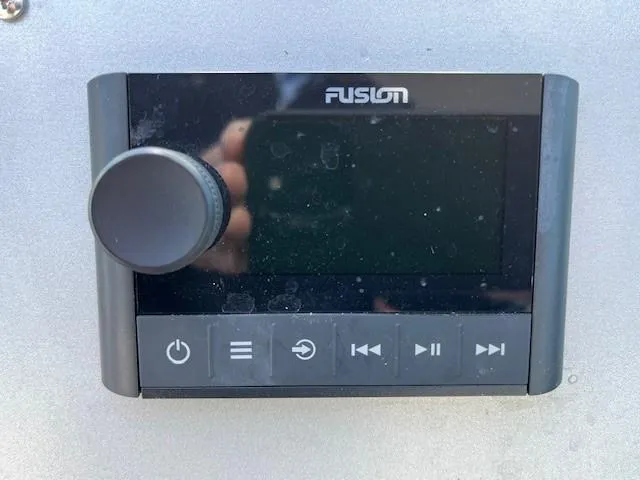 Slide: The Image of Fusion audio control panel on 2009 Four Winns V435 boat. - 25