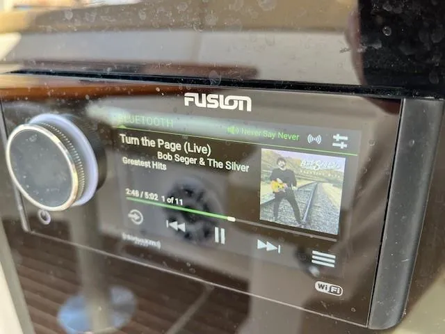 Slide: The Image of Fusion stereo displaying Bob Seger's "Turn the Page (Live)" on a 2009 Four Winns V435. - 29