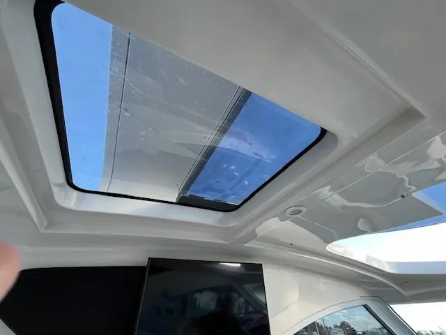 Slide: The Image of Interior view of 2009 Four Winns V435 yacht with skylight and modern design. - 4