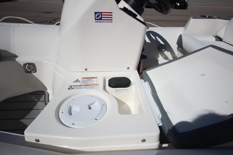 Slide: The Image of Close-up of Zodiac Yachtline 360 DL NEO 40hp console, 2025 model, showcasing controls and seating. - 9