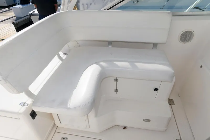 Slide: The Image of White seating area on a 2000 Pursuit 3400 Express boat. - 12