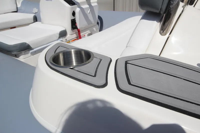 Slide: The Image of 2025 Zodiac Yachtline 360 DL PVC boat interior with cup holder and seating. - 11