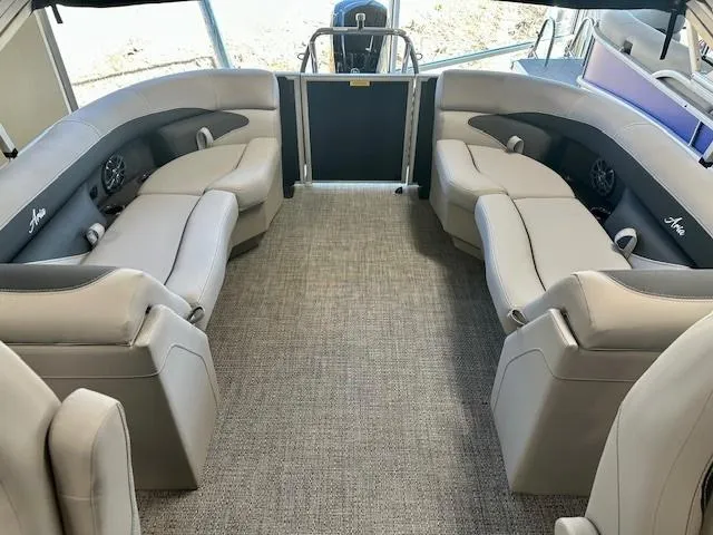 Slide: The Image of Luxurious interior of 2025 Barletta A22QC pontoon boat with plush seating and modern design. - 6