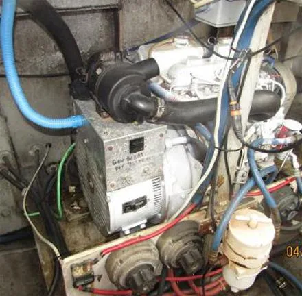 Slide: The Image of Engine compartment of a 1988 Custom Universal Ship Building Sport boat. - 12