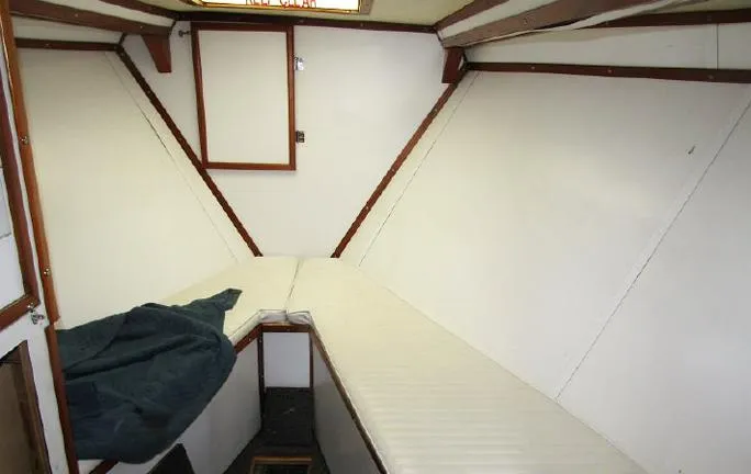 Slide: The Image of Interior of 1988 Custom Universal Ship Building Sport, featuring a minimalist cabin design. - 4