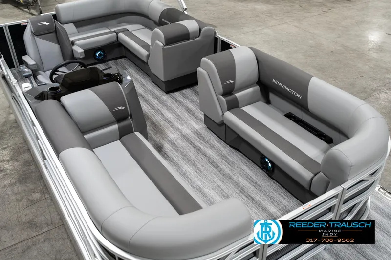 Slide: The Image of 2025 Bennington 118 SLS pontoon boat interior with gray seating and modern design. - 10