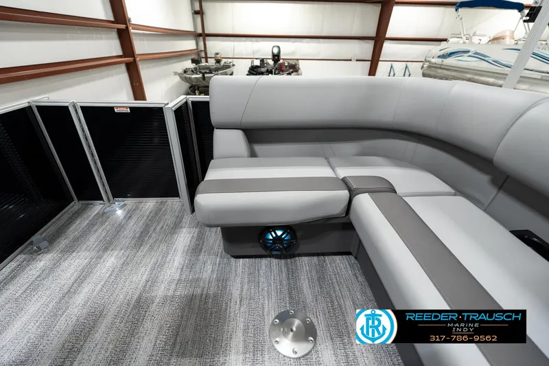 Slide: The Image of 2025 Bennington 118 SLS boat interior with gray seating and modern design. - 15