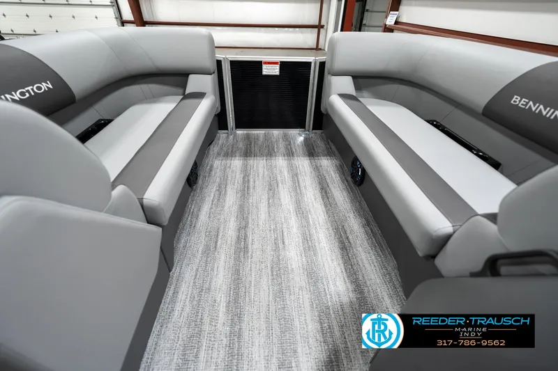 Slide: The Image of 2025 Bennington 118 SLS interior with gray seating and flooring. - 18